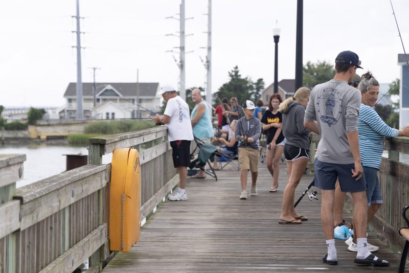 people fishing in chincoteague bay